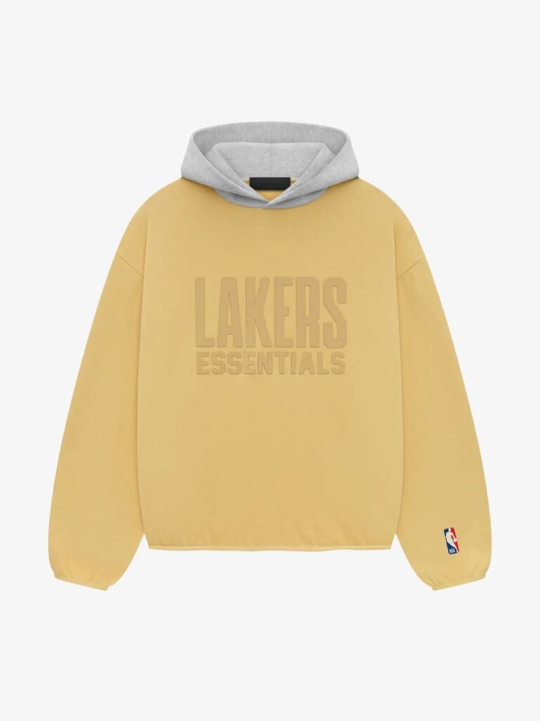 Yellow Los Angeles Lakers essentials hoodie displayed on a hanger against a neutral background