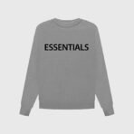 FG Essentials Crewneck Sweatshirt featuring the word "essentials" prominently displayed on the front.