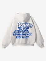 A cozy white sweatshirt displaying the fun slogan "espo doot ride a lot" prominently across the front.
