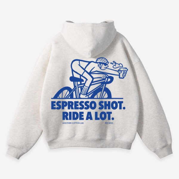 A cozy white sweatshirt displaying the fun slogan "espo doot ride a lot" prominently across the front.