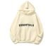 A cozy essentials hoodie in a neutral color, featuring a front pocket and drawstring hood, perfect for casual wear.